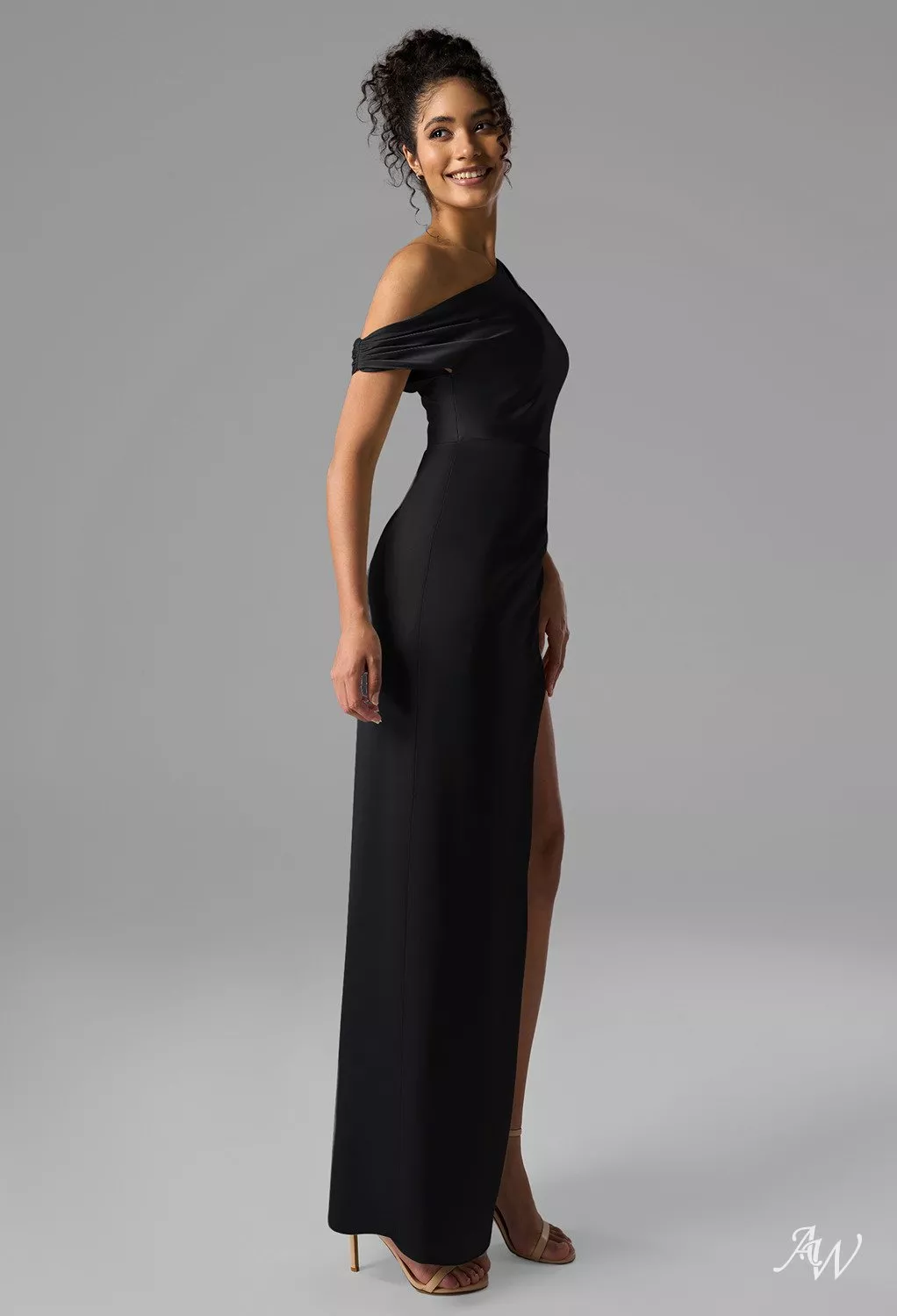 rihanna black satin dress Speaking of Rihanna's second look, she wore a black dress for the event, in  which she looked absolutely stunning. During the event, she posed for the  paps in stunning poses. To complete