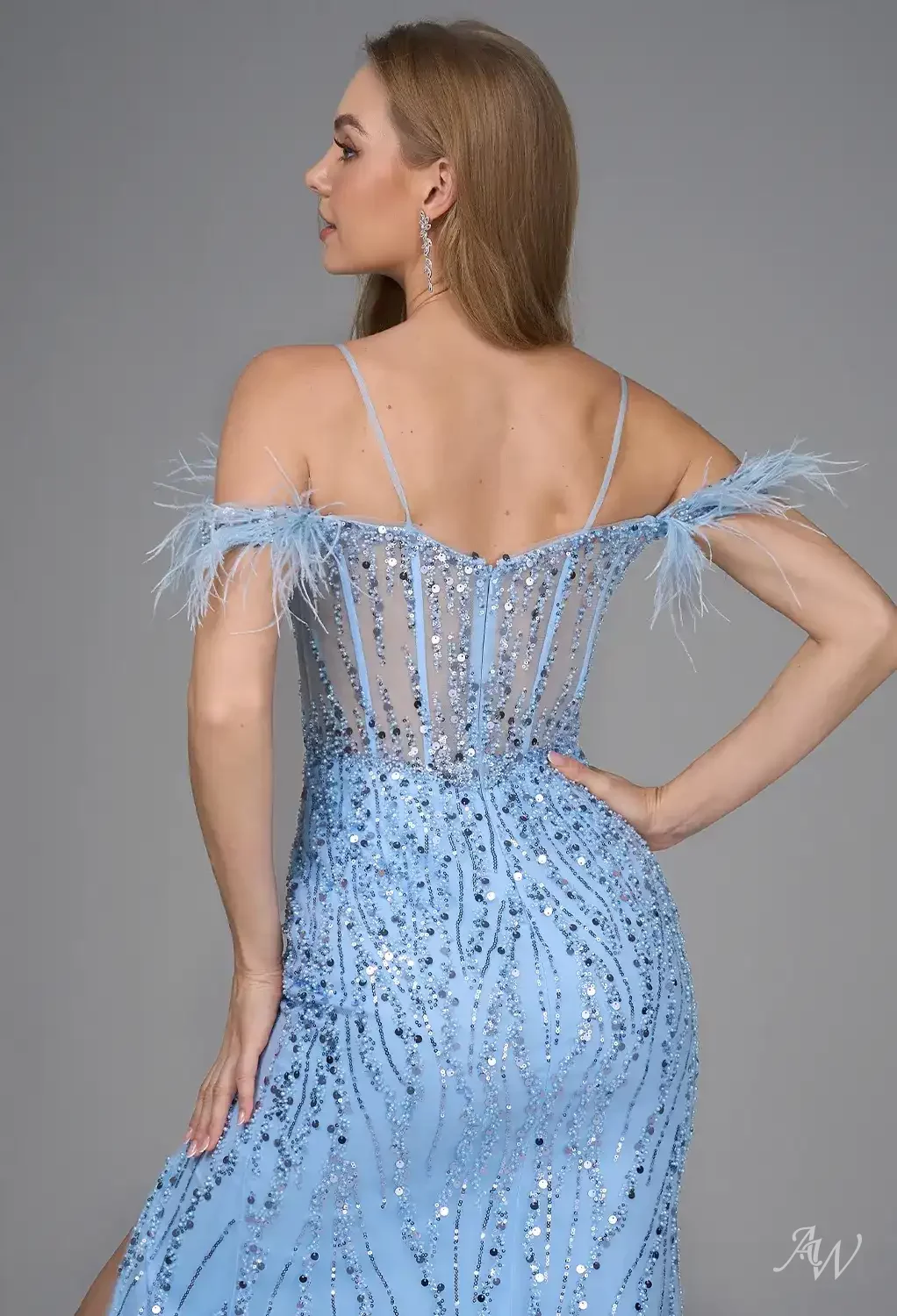 sachin and babi light blue dress The Etiquette of What to Wear to Your Holiday Parties main image 1