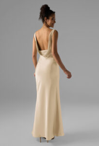 A classic mermaid silhouette with a strapless V-neck design and an elegant cowl back.